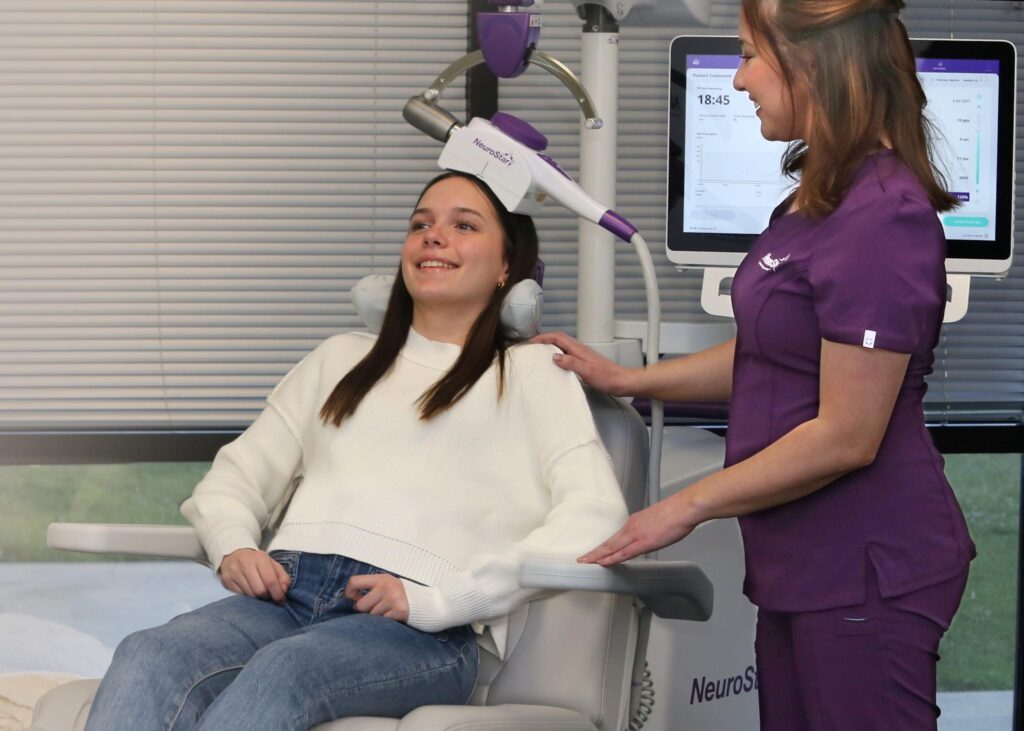 Patient discussing mental health treatment options with a psychiatrist.